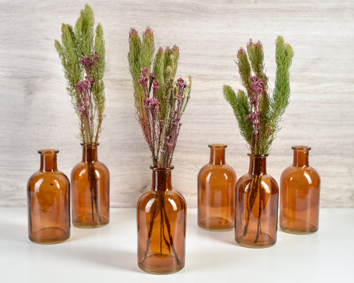 Serene Spaces Living Amber Medicine Bottle Bud Vases, Set of 48 - Antique Glass Bottles, 5.25" Tall & 2.5" in Diameter