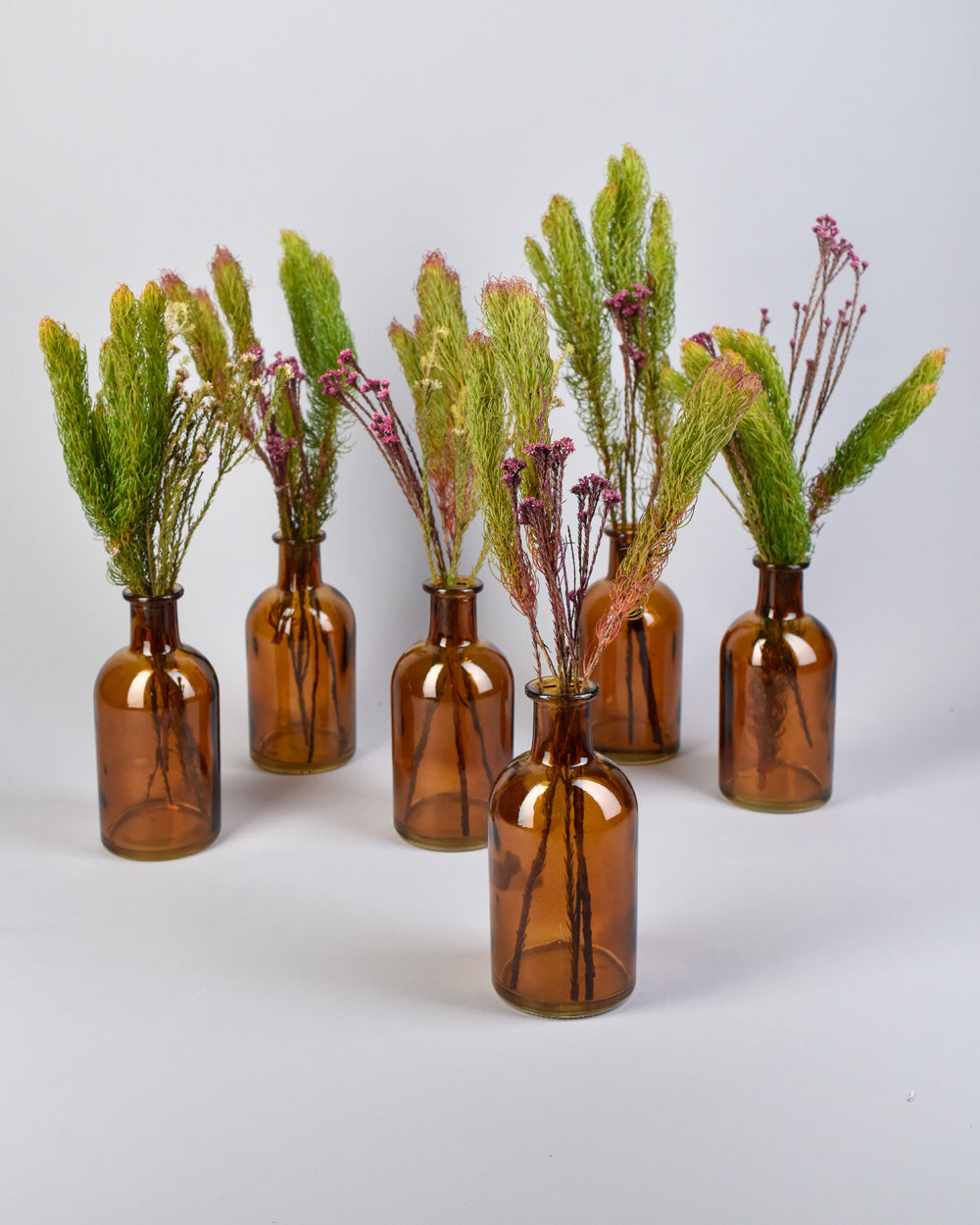 Serene Spaces Living Amber Medicine Bottle Bud Vases, Set of 48 - Antique Glass Bottles, 5.25" Tall & 2.5" in Diameter